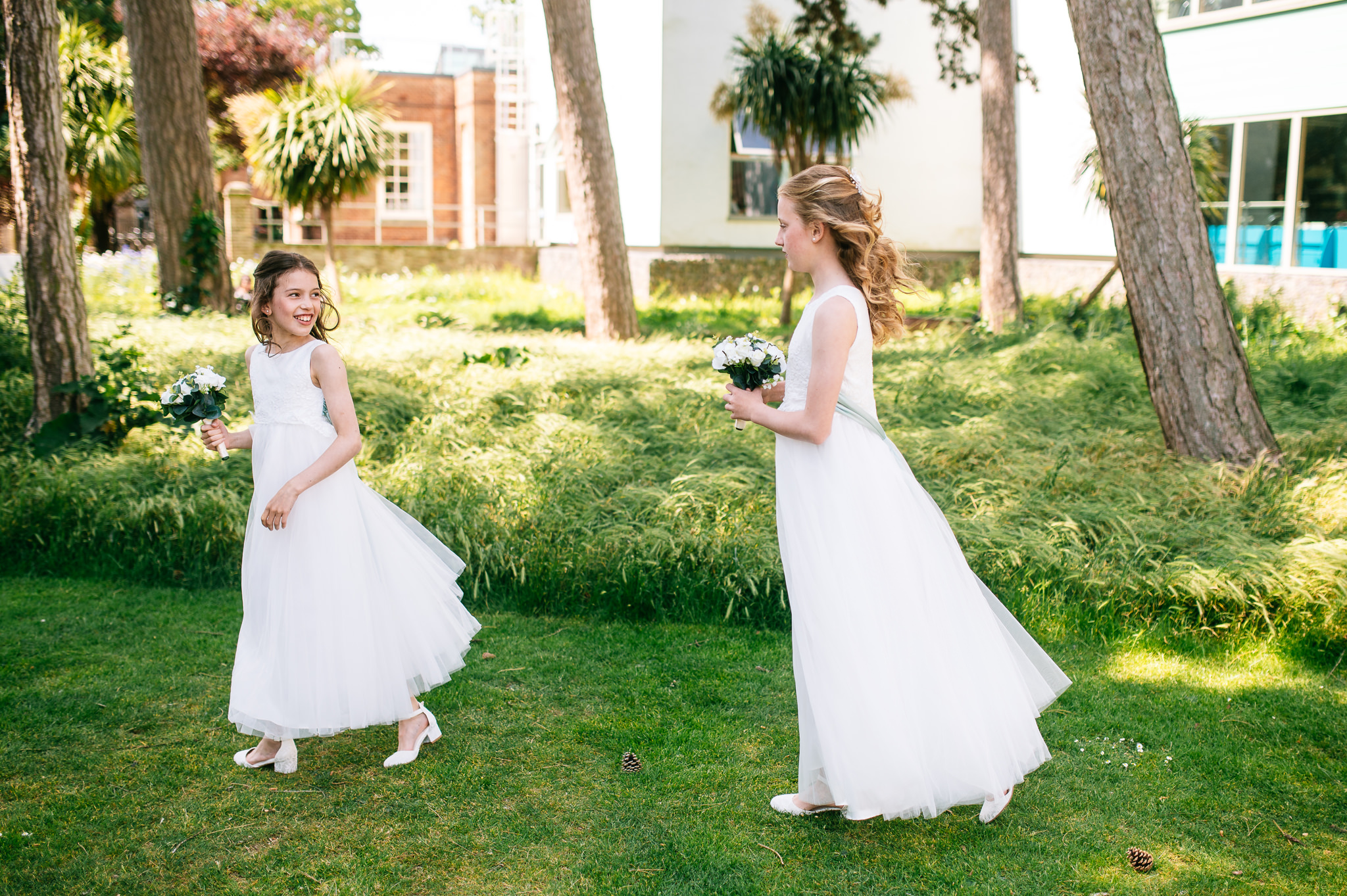 young bridesmaids playing in the grounds of bridgford hall in west bridgford
